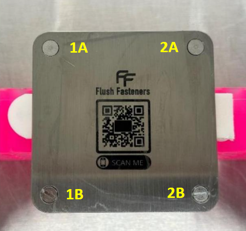 Laboratory test setup comparing flush and slotted fasteners on stainless steel plate for bacterial contamination analysis